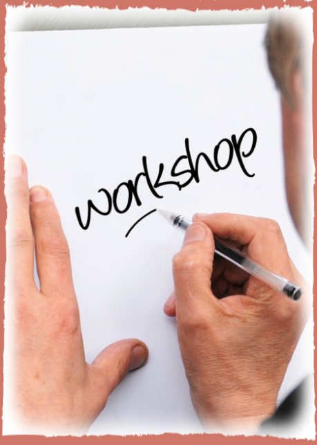 Flipchart mit Wort Workshop; Hände, die schreiben